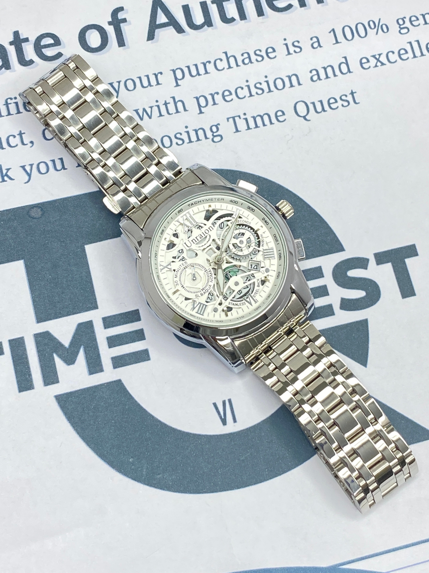 UNRAION Men’s Skeleton Dial Stainless Steel Chain Analog Watch with Date Display